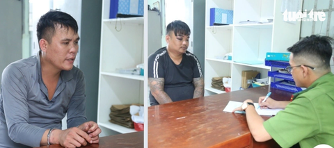 Công an lấy lời khai hai người đi ô tô rải đinh trộm chó - Ảnh: T.D. Công an lấy lời khai hai người đi ô tô rải đinh trộm chó - Ảnh: T.D.