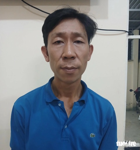 Bắt đối tượng giết người rồi trốn truy nã đặc biệt sau 7 năm- Ảnh 1. Đào Hữu Tấn Hưng lúc bị bắt - Ảnh: HOÀI ANH