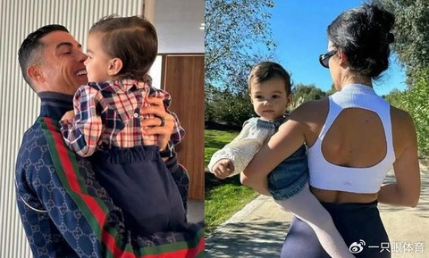 Tình cha ấm áp của Ronaldo dành cho các con- Ảnh 1. Ronaldo và Georgina Rodriguez cùng bế con gái Bella - Ảnh: SINA