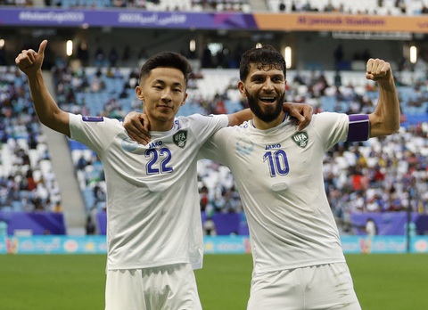 Thua Uzbekistan 1-2, Thái Lan dừng bước tại Asian Cup 2023- Ảnh 2. Fayzullaev (số 22) ăn mừng bàn thắng cho Uzbekistan - Ảnh: REUTERS