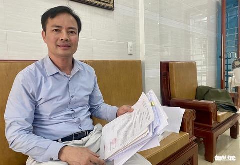 Tiệm vàng mở 'sổ tiết kiệm' như ngân hàng, các cụ già bật khóc vì mất tiền- Ảnh 3. Ông Nguyễn Vĩnh Tám - chủ tiệm vàng Tám Nhâm - cho rằng vợ chồng ông cũng là bị hại trong một vụ vỡ nợ khác - Ảnh: DOÃN HÒA