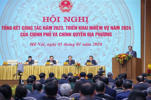 Hội nghị Chính phủ với địa phương: Gỡ điểm nghẽn cho sản xuất, kinh doanh- Ảnh 3. Thủ tướng phát biểu khai mạc hội nghị - Ảnh: VGP