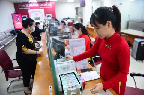 Hé lộ lợi nhuận 4 ‘ông lớn’ ngân hàng: Lãi tỉ USD, nhiều nơi lập kỷ lục?- Ảnh 1. Nhóm ngân hàng Big4 báo lãi lớn cả năm 2023 - Ảnh: QUANG ĐỊNH