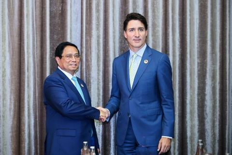 Thủ tướng gặp Thủ tướng Canada, Malaysia, New Zealand, Chủ tịch Hội đồng châu Âu tại Lào - Ảnh 1.
