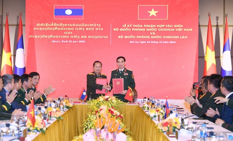 Ký nghị định thư hợp tác quốc phòng Việt Nam - Lào giai đoạn 2025-2029 - Ảnh 4.
