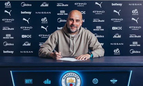 HLV Guardiola mục tiêu giành thêm nhiều danh hiệu, sau khi gia hạn với Man City đến năm 2027 - Ảnh 1.