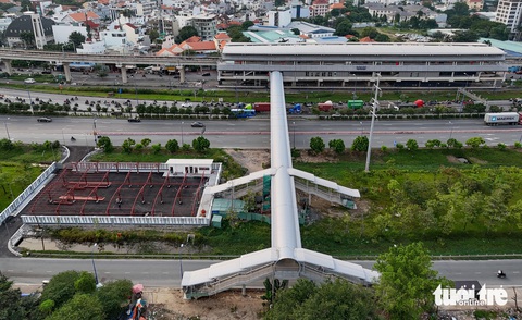 Người dân có lo thiếu chỗ gửi xe và có được mang xe đạp lên tàu metro? - Ảnh 1.