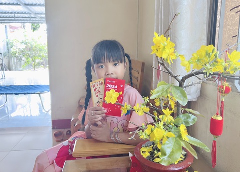 Lì xì gì mà có 50.000 đồng: Bạn trẻ có nên lì xì?- Ảnh 2. Trẻ con hồn nhiên, vì vậy nhiều bạn trẻ cho rằng nên lì xì mang niềm vui cho trẻ - Ảnh: YẾN TRINH