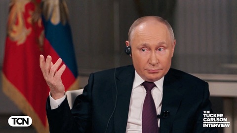 Nga bác chuyện ông Putin đề xuất với Mỹ ngừng bắn ở Ukraine- Ảnh 1. Biểu cảm của Tổng thống Nga Putin trong cuộc phỏng vấn với nhà báo Tucker Carlson được công bố hôm 8-2 - Ảnh: REUTERS