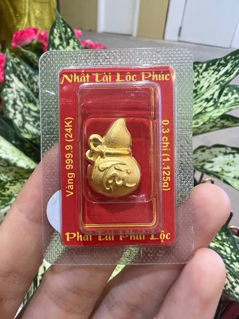 Ngày Thần Tài với giá vàng cao nhất trong lịch sử- Ảnh 5. Sản phẩm vàng may mắn tại SBJ - Ảnh: T.H