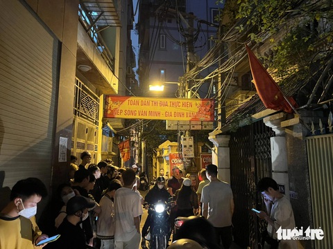 Tìm thấy thi thể cô gái 21 tuổi mất tích ngày mùng 7 Tết tại một phòng trọ ở Hà Nội- Ảnh 4. Con ngõ, nơi lực lực lượng công an khám nghiệm hiện trường - Ảnh: DANH TRỌNG