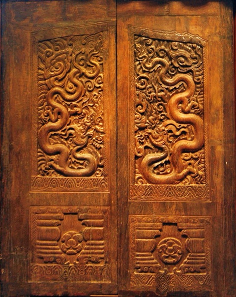 Hoa văn rồng trên bộ cánh cửa chùa Phổ Minh đời Trần - Ảnh: Bảo tàng tỉnh Nam Định Hoa văn rồng trên bộ cánh cửa chùa Phổ Minh đời Trần - Ảnh: Bảo tàng tỉnh Nam Định