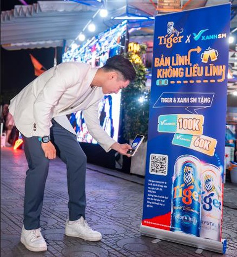 Hàng quán khởi sắc sau thời gian tìm cách ‘thoát đáy’- Ảnh 4. Xanh SM và Tiger Beer đồng hành gửi tặng khách hàng những mã ưu đãi khi đặt xe đi đến hoặc ra về tại nhà hàng, quán ăn trong khu vực TP.HCM, với giá trị 100.000 đồng/ chuyến cho xe hơi và 60.000 đồng/ chuyến cho xe máy và xe hơi