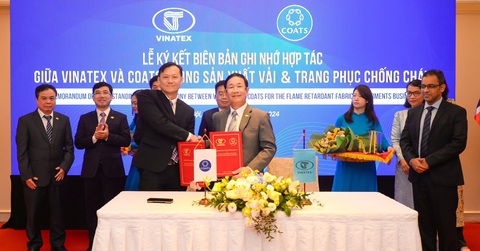 Doanh nghiệp Việt Nam lần đầu xuất khẩu vải từ xơ chịu nhiệt, chống cháy- Ảnh 1. Vinatex ký kết bản ghi nhớ hợp tác sản xuất vải và trang phục chống cháy - Ảnh: Q.NAM