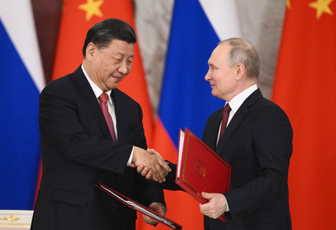 Ông Tập Cận Bình: Ông Putin tái đắc cử phản ánh sự ủng hộ của người dân Nga- Ảnh 1. Chủ tịch Trung Quốc Tập Cận Bình và Tổng thống Nga Vladimir Putin tại Matxcơva tháng 3-2023 - Ảnh: AFP