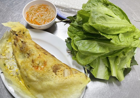 Bánh xèo tại một quán ở quận 1, TP.HCM - Ảnh: NHÃ XUÂN Bánh xèo tại một quán ở quận 1, TP.HCM - Ảnh: NHÃ XUÂN