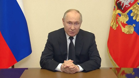 Tổng thống Putin tuyên bố quốc tang- Ảnh 1. Tổng thống Nga Vladimir Putin trong bài phát biểu qua video trước toàn quốc ngày 23-3 - Ảnh: REUTERS/ĐIỆN KREMLIN