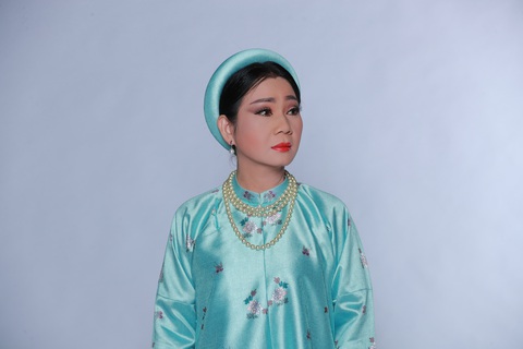 Nghệ sĩ Hoàng Trinh với tạo hình bà Đỗ Thị Phận - Ảnh: Nhà hát kịch Idecaf cung cấp Nghệ sĩ Hoàng Trinh với tạo hình bà Đỗ Thị Phận