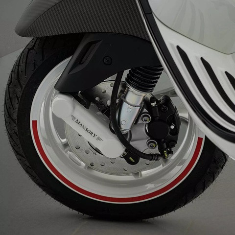 Vespa điện phiên bản đặc biệt: Chỉ có 99 chiếc, giá có thể ngang ô tô- Ảnh 7. Ngoài ra, biểu tượng truyền thống của Piaggio và Vespa đã được thay thế bằng nhãn hiệu Mansory - Ảnh: Mansory