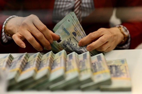 'Lãi suất sẽ tăng trở lại'- Ảnh 1. Ngân hàng VietinBank nhận định lãi suất sẽ tăng trở lại khi 15 ngân hàng vừa tăng lãi suất tiền gửi - Ảnh: QUANG ĐỊNH