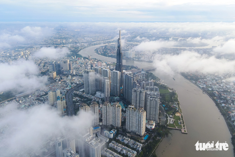 Hai lý do chính khiến TP.HCM là nơi có nhiều người muốn đến sinh sống nhất năm 2023: đoàn tụ gia đình và công việc tốt hơn - Ảnh: CHÂU TUẤN