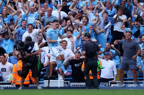Man City đăng quang vô địch Premier League 2023-2024- Ảnh 3. Foden ăn mừng bàn thắng vào lưới West Ham - Ảnh: REUTERS