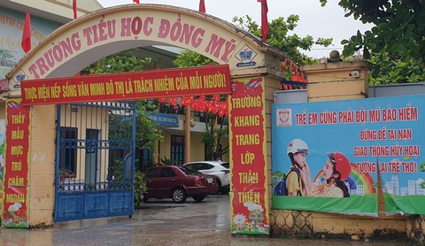 Học sinh lớp 1, lớp 2 nhận giấy bắt thi Đại sứ văn hóa đọc, viết bài luận về sách- Ảnh 2. Trường tiểu học Đồng Mỹ, một trong nhiều trường vừa triển khai cuộc thi Đại sứ văn hóa đọc đến toàn bộ học sinh từ khối 1 đến khối 5 - Ảnh: QUỐC NAM