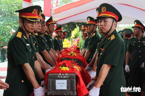 An táng 87 hài cốt liệt sĩ hy sinh ở Lào- Ảnh 1. Mùa khô 2023-2024, đội quy tập mộ liệt sĩ Nghệ An đã tìm kiếm, cất bốc đưa 87 hài cốt liệt sĩ hy sinh ở Lào về nước - Ảnh: DOÃN HÒA