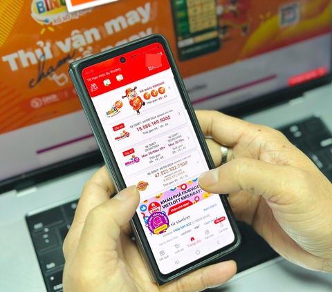 Gần 4 tỉ đồng được trả thưởng qua Vietlott SMS mỗi ngày- Ảnh 3. Gần 4 tỉ đồng được trả thưởng qua Vietlott SMS mỗi ngày- Ảnh 3.