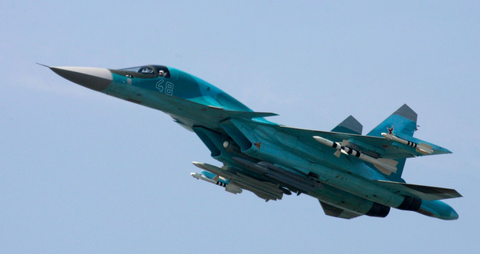 Máy bay ném bom Su-34 của Nga rơi, toàn bộ phi hành đoàn thiệt mạng- Ảnh 1. Một máy bay ném bom Su-34 của Nga - Ảnh: REUTERS/DENIS SINYAKOV