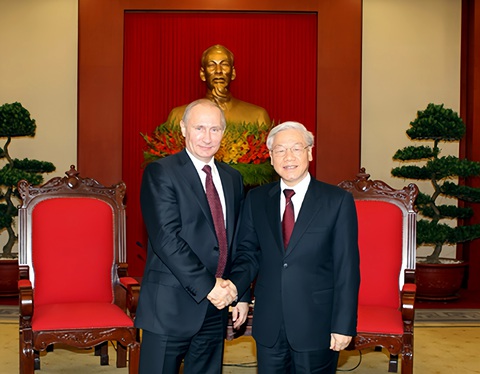 Lần thứ 5 đến Việt Nam, Tổng thống Putin thăm cấp nhà nước theo lời mời Tổng bí thư- Ảnh 1. Tổng bí thư Nguyễn Phú Trọng gặp Tổng thống Putin tại Hà Nội tháng 11-2013 - Ảnh: TTXVN