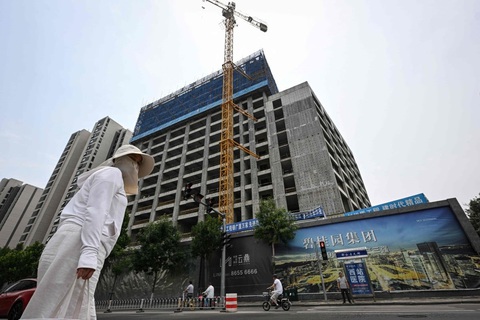 Trung Quốc cải cách vấn đề hộ khẩu kích cầu thị trường bất động sản- Ảnh 1. Trung Quốc thúc đẩy việc giải quyết tồn kho nhà ở trong bối cảnh thị trường còn ảm đạm - Ảnh: SCMP