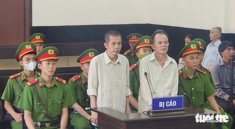 Lãnh 16 năm tù vì 'hoạt động nhằm lật đổ chính quyền nhân dân'- Ảnh 1. Bị cáo Nguyễn Đức Thanh (phải) và Nhựt Kim Bình tại phiên tòa xét xử sơ thẩm - Ảnh: HOÀI THƯƠNG