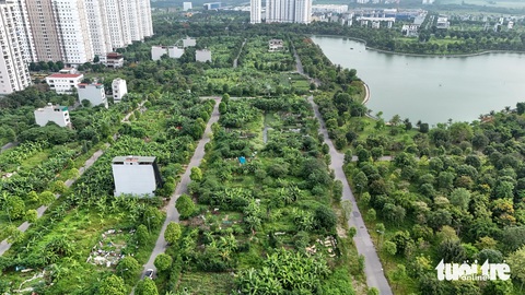 Ngã ngửa vì cọc tiền mua đất liền kề lòi ra đất biệt thự- Ảnh 3. Một góc khu đất quy hoạch đất biệt thự và đến nay chủ đầu tư vẫn chưa được UBND TP Hà Nội phê duyệt chuyển đổi quy hoạch sang đất liền kề - Ảnh: DANH KHANG