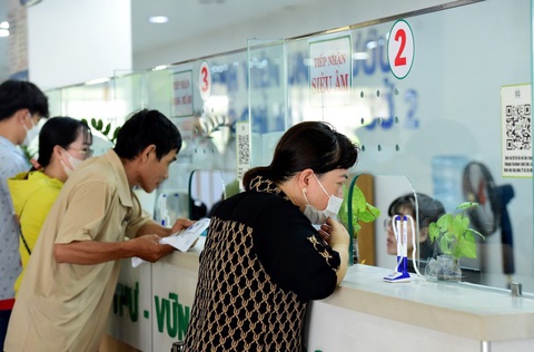 Người dân đi khám bệnh, siêu âm tại một bệnh viện - Ảnh: DUYÊN PHAN Người dân đi khám bệnh, siêu âm tại một bệnh viện - Ảnh: DUYÊN PHAN