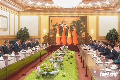 Việt Nam - Trung Quốc nghiên cứu thí điểm khu hợp tác kinh tế qua biên giới- Ảnh 1. Thủ tướng Phạm Minh Chính hội kiến với Tổng bí thư, Chủ tịch nước Tập Cận Bình - Ảnh: NGỌC AN