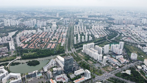 Công ty Phú Mỹ Hưng phản hồi gì về kết luận thanh tra?- Ảnh 1. Toàn cảnh đô thị Phú Mỹ Hưng gắn với trục Nguyễn Văn Linh - Ảnh: MINH HÒA