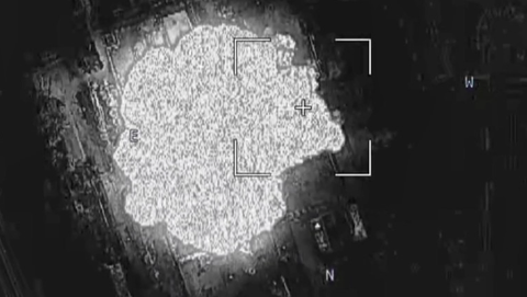 Đài Nga đăng video Matxcơva thả bom khổng lồ xuống vùng Donbass- Ảnh 1. Cảnh dùng bom hạng nặng ở Donbass - Ảnh chụp màn hình RT/Telegram