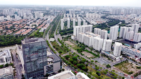 Bất cập quản lý quy hoạch, xây dựng khu Nam- Ảnh 1. Công ty Phú Mỹ Hưng được yêu cầu xây dựng hoàn chỉnh trục Nguyễn Văn Linh để bàn giao cho Nhà nước - Ảnh: MINH HÒA