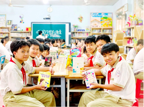 Trường THCS Nguyễn Hữu Thọ, quận 7 tuyển sinh bổ sung vào lớp 6- Ảnh 1. Học sinh Trường THCS Nguyễn Hữu Thọ, quận 7, TP.HCM trong giờ đọc sách - Ảnh: THANH TÂM