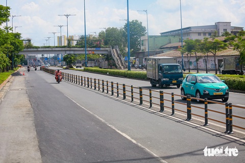 Xóa 'con lươn', mở rộng đường Võ Văn Kiệt từ Tân Kiên về hầm Thủ Thiêm- Ảnh 11. Tổng vốn cải tạo đoạn đường trên khoảng 13,1 tỉ đồng - Ảnh: LÊ PHAN