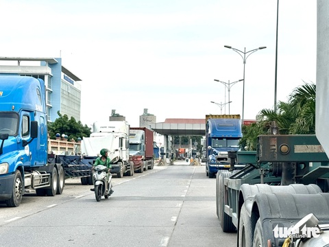Đề xuất giảm phí hạ tầng cảng biển cho hàng hóa qua BOT Phú Hữu- Ảnh 1. Đoạn đường nối từ Nguyễn Duy Trinh vào Khu công nghiệp Phú Hữu (TP Thủ Đức) sắp thu phí - Ảnh: THU DUNG