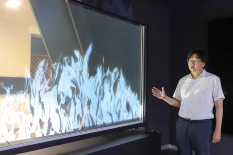 Sắp có tivi màn hình trong suốt 100 inch, mỏng như sợi tóc- Ảnh 1. Màn hình nano trong suốt (NTS) 100 inch mỏng như sợi tóc người - Ảnh: Viện Máy móc và Vật liệu Hàn Quốc