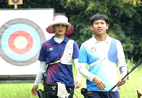 Cú hích từ Ánh Nguyệt và Quốc Phong- Ảnh 1. Ánh Nguyệt và Quốc Phong là đại diện cho bắn cung Việt Nam tại Olympic Paris 2024 - Ảnh: HOÀNG TÙNG