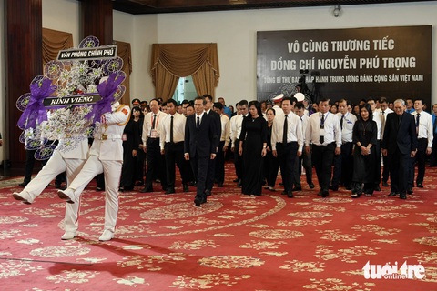 Lễ viếng Tổng Bí thư Nguyễn Phú Trọng tại Hội trường Thống Nhất: Nhớ nhà lãnh đạo đức độ, tài năng- Ảnh 17. Lễ viếng Tổng Bí thư Nguyễn Phú Trọng tại Hội trường Thống Nhất: Nhớ nhà lãnh đạo đức độ, tài năng- Ảnh 17.