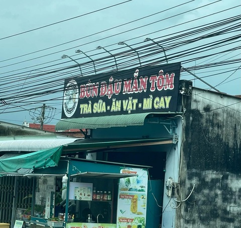 Ảnh vui 28-7: Ô tô 'vào bao' để tránh ngập nước mùa mưa- Ảnh 3. Mắm tôm