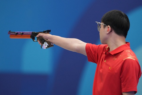 Yu Xie thi đấu nội dung 10m súng ngắn hơi nam chiều 28-7 - Ảnh: REUTERS Olympic Paris 2024 ngày 28-7: Nhật Bản, Mỹ bứt lên- Ảnh 11.
