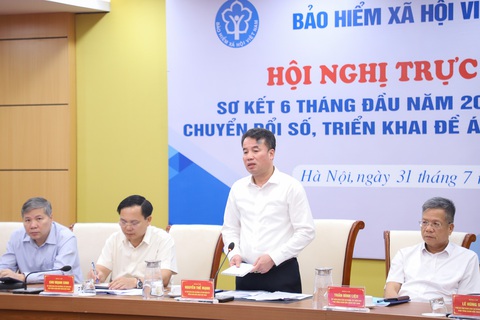 Tổng giám đốc Bảo hiểm xã hội Việt Nam Nguyễn Thế Mạnh kết luận hội nghị - Ảnh: HÀ QUÂN Lãnh đạo C06 Bộ Công an cảnh báo nguy cơ hacker tấn công dữ liệu bảo hiểm xã hội- Ảnh 2.
