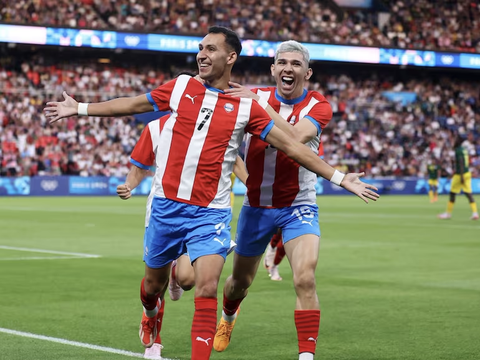 Olympic Paraguay giành vé cuối cùng vào tứ kết bóng đá nam Olympic 2024- Ảnh 1. Marcelo Fernandez (7) ăn mừng bàn thắng cho Olympic Paraguay - Ảnh: ALBIRROJA