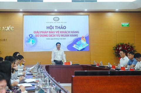 Tội phạm mạng dùng ảnh nhạy cảm để tống tiền- Ảnh 1. Lãnh đạo Ngân hàng Nhà nước phát biểu khai mạc hội thảo - Ảnh: CTV